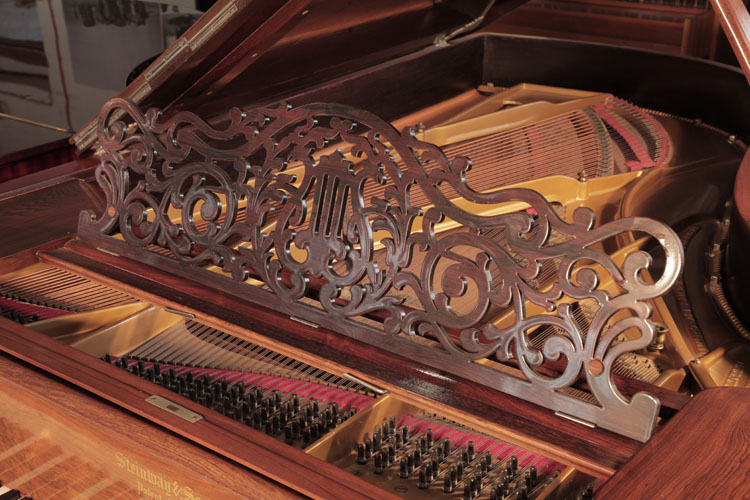 Steinway Style 1 grand  music desk in an openwork filigree design of arabesques and a central lyre motif