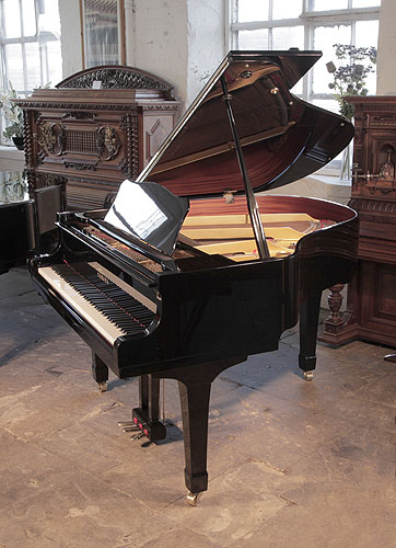 Reconditioned,  1987, Yamaha G1 baby grand piano for sale with a black case and square, tapered legs