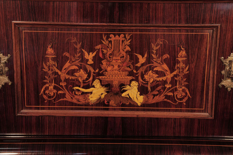 Ascherburg front panel inlaid with a central lyre flanked by two reclining femal figures, scrolling acanthus, hibiscus, birds and torches in a variety of woods.