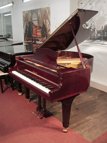 Piano for sale. Reconditioned, 2000,  Eavestaff F158 baby grand piano for sale with a mahogany case and spade legs Piano has an eighty-eight note keyboard and a three-pedal lyre.