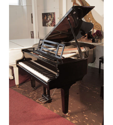 Pre-owned, 2018, Feurich Model 179 Dynamic II grand piano with a black case, chrome fittings and square tapered legs.  Piano music desk features an adjustable LED strip light to illuminate sheet music. Piano has an eighty-eight note keyboard and a three-pedal lyre