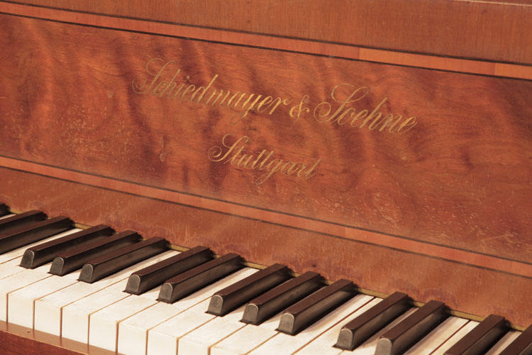 Schiedmayer piano manufacturers logo inlaid in brass  on fall
