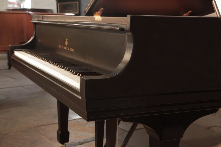 Steinway  model L square piano cheek . We are looking for Steinway pianos any age or condition.