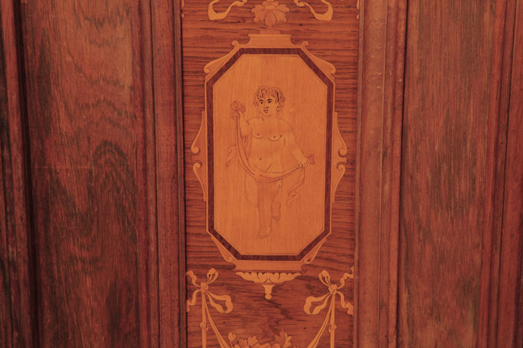 Steinway side panel  inlaid with a swathed cherub