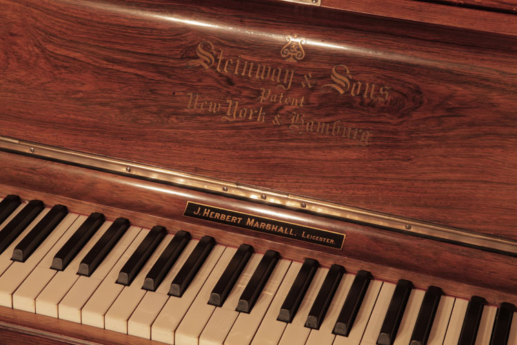 Steinway manufacturers name inlaid  on fall