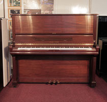Reconditioned, Young Chang U-131 upright piano for sale with a walnut case and brass fittings