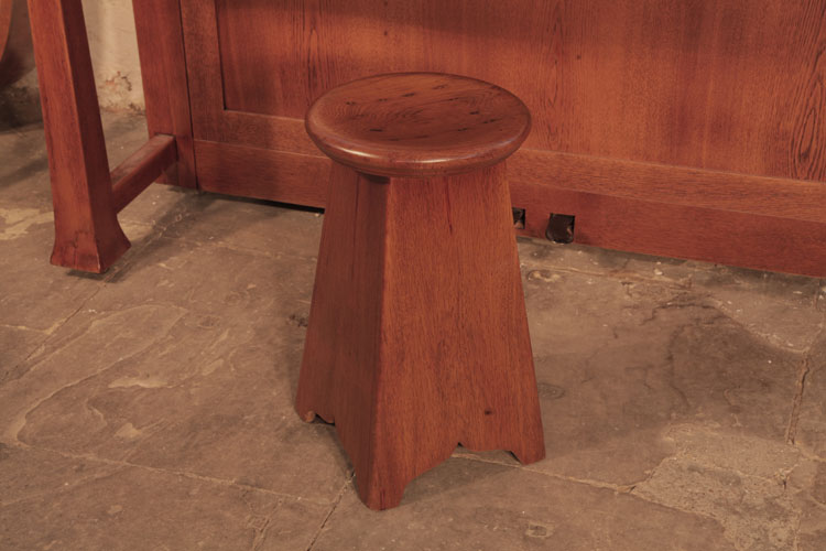 Matching oak piano stool