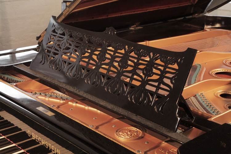 Bechstein Model D openwork music desk in a repeated, stylised floral design