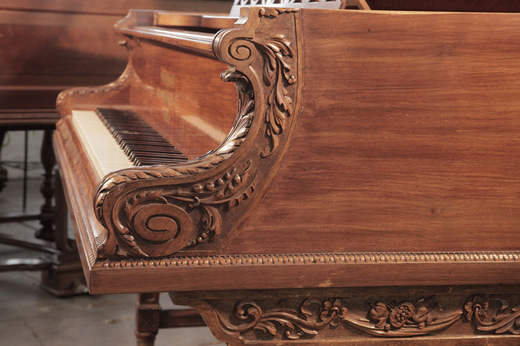Bechstein Model D C-scroll piano cheek with carved acanthus embellishment. Cabinet features acanthus leaf moulding that wraps around the cabinet base