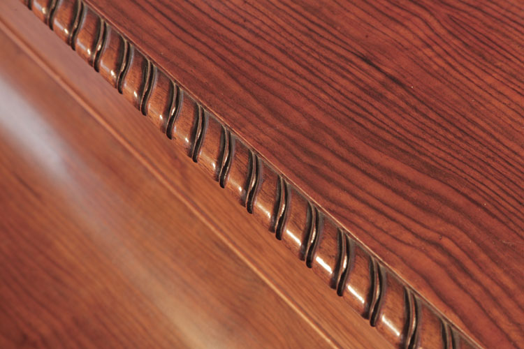 Bechstein top lid bordered with carved gadrooning 