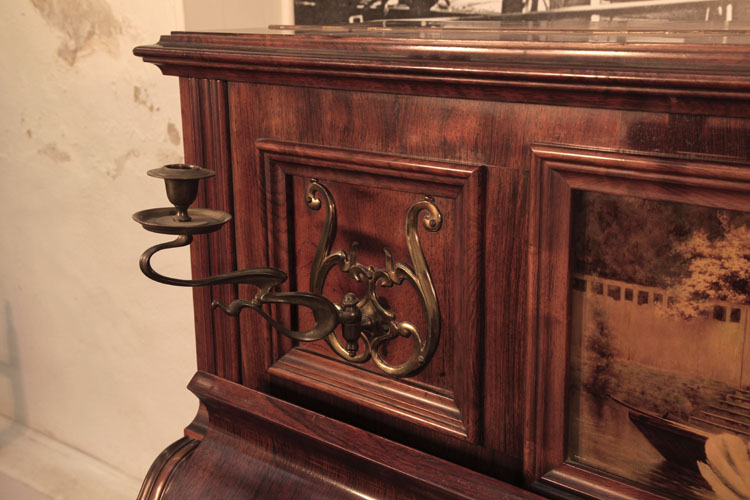 Brinsmead  brass candlestick in a scrolling whiplash design