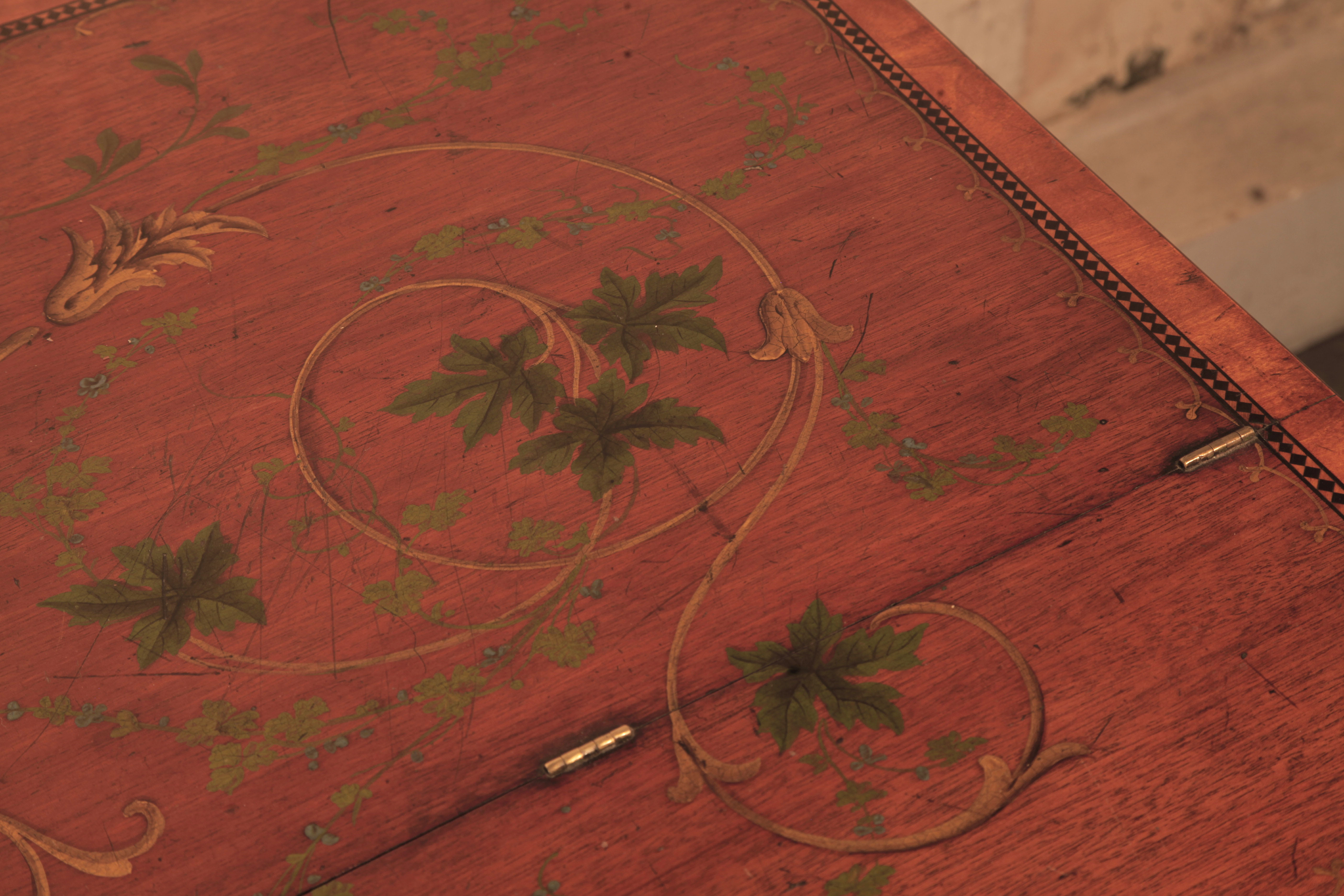 Piano lid featuring hand-painted detail of vine leaves and tendrils