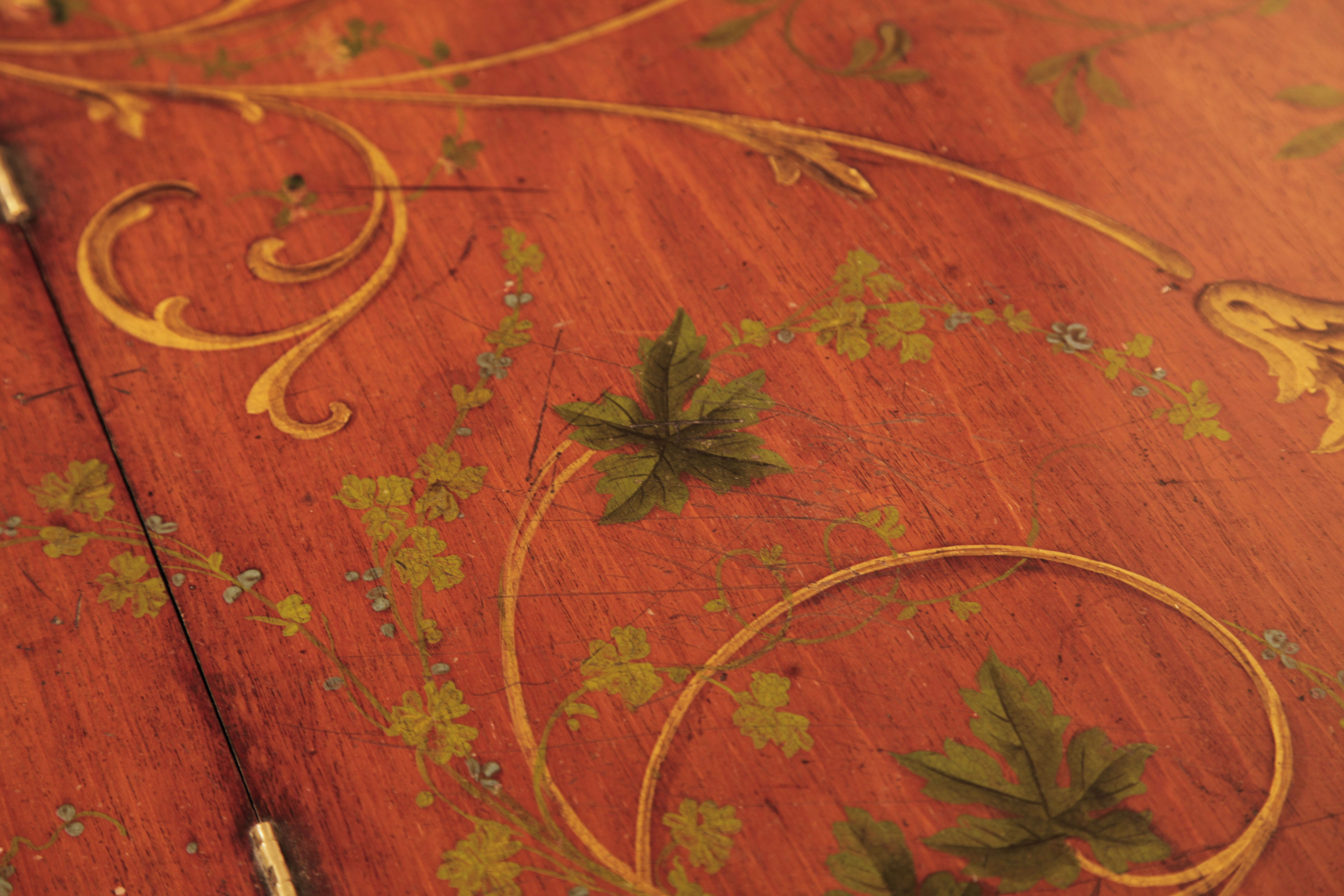 Hand-painted detail of lid featuring acanthus, flowers and vine leaves