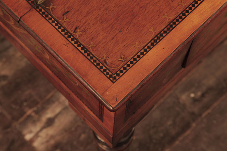 Broadwood cabinet border inlaid with ebony harlequin stringing and interlocked C-scrolls