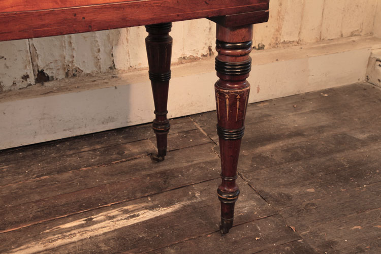 Broadwood turned, tapered leg with hand-painted black and gilt ornament and cup casters 