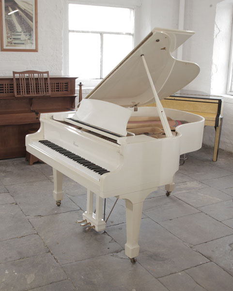 Reconditioned, Cranes SG-172 grand piano in ivory gloss with brass fittings. Piano has an eighty-eight note keyboard and a three-pedal piano lyre.