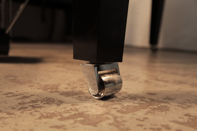 Feurich square tapered, piano leg with wide chrome casters