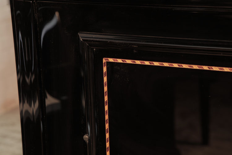 Contrasting, crossbanded stringing inlay on cabinet