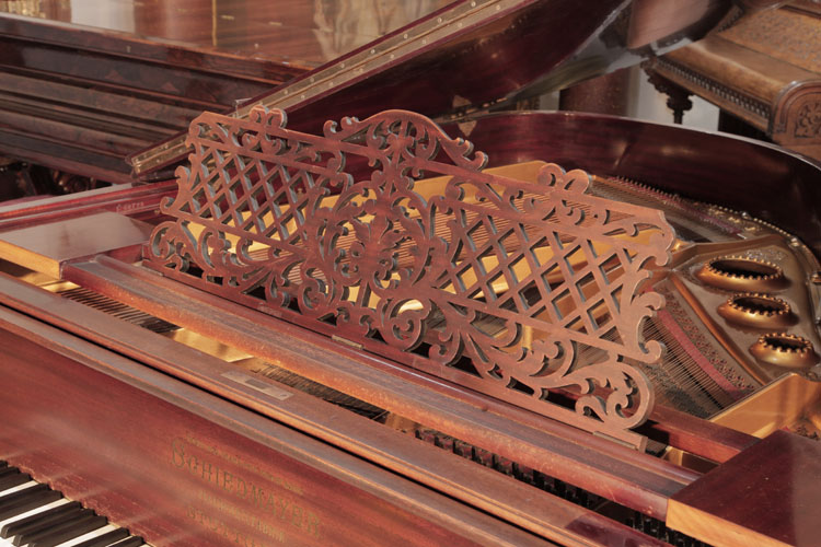 Schiedmayer music desk in an openwork design of latticework and stylised acanthus