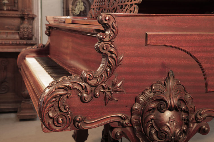 Schiedmayer piano cheek carved in high relief with scrolling acanthus, foliage and c-scrolls