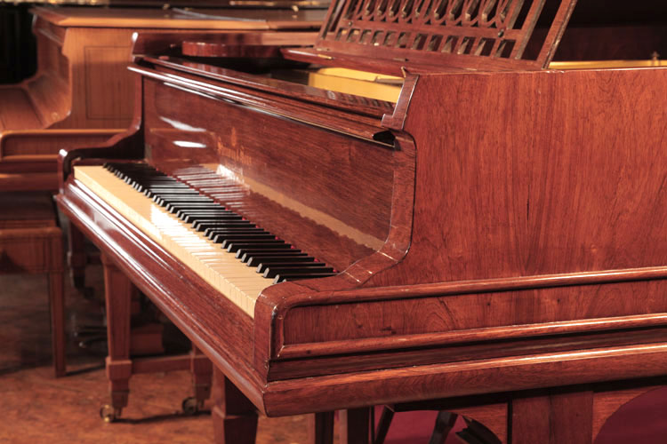 Steinway Model B serpentine piano cheek with double linear case moulding