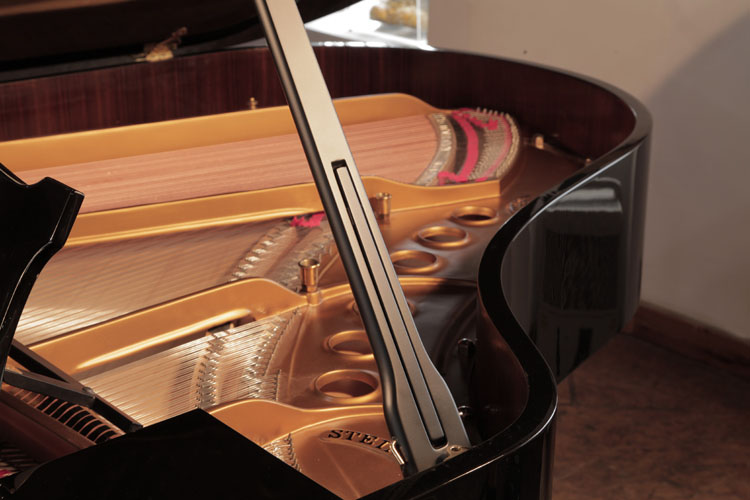Steinway prop stick features an indented half prop so the lid can be open at differing heights