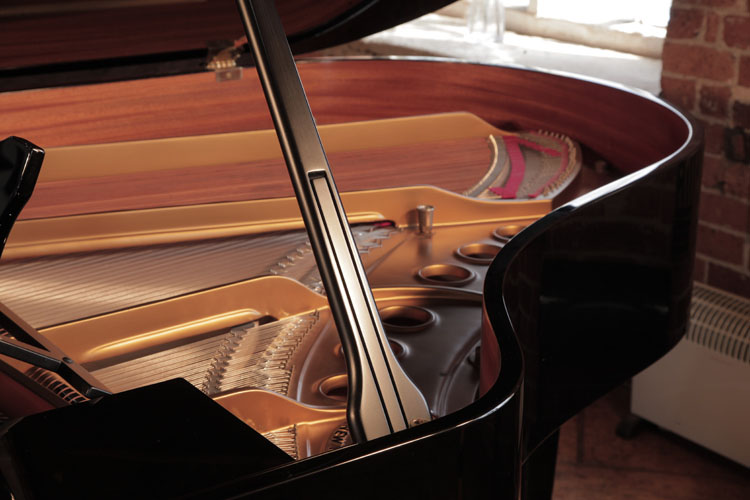 Steinway Model M piano lid stay with indented half prop to allow piano lid to be opened at different heights