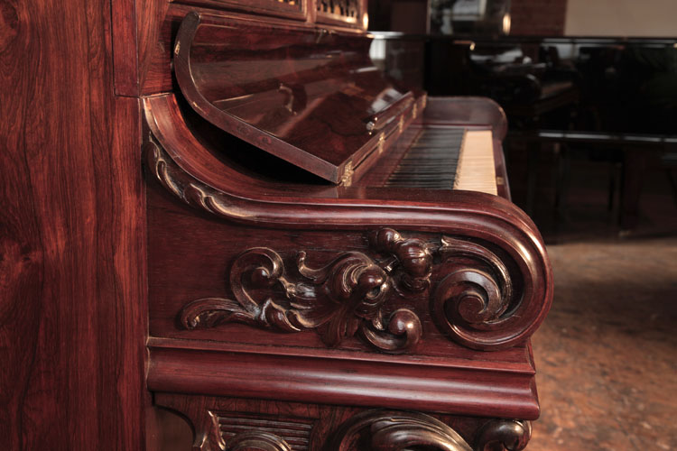 Steinway scrolling piano cheek carved with hibiscus and foliage