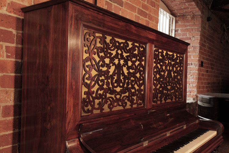Steinway openwork front panels in an arabesque design with central lyre motif