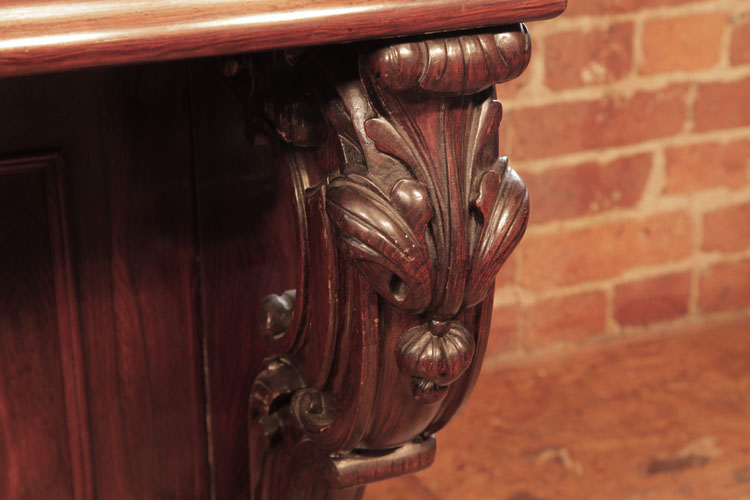 Carvings on piano leg 