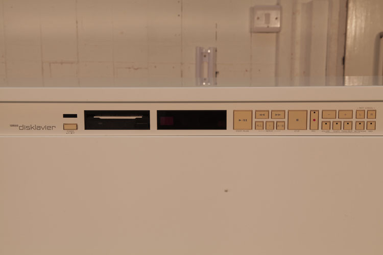 Yamaha Disklavier function buttons incorporated into the front cabinet panel