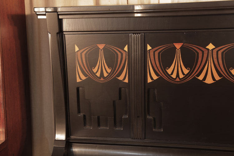 Seiler side panel inlaid with repeated, stylised fans within bold geometric, angular forms and indented stepped block motifs.