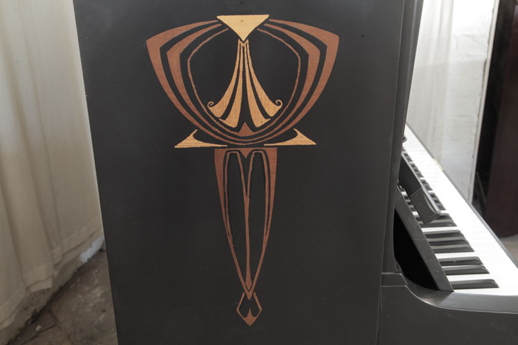 Seiler side panel inlaid with a stylised fan and geometric forms