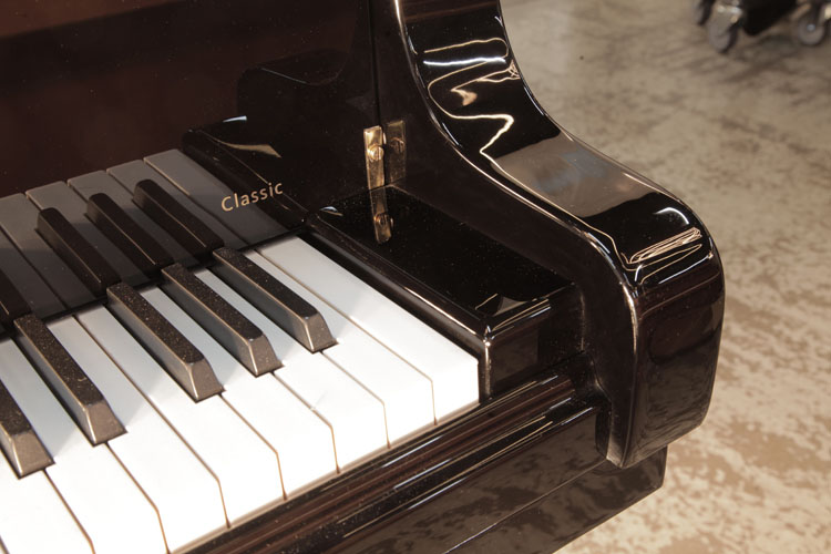 Schimmel rounded piano cheek with slow fall mechanism