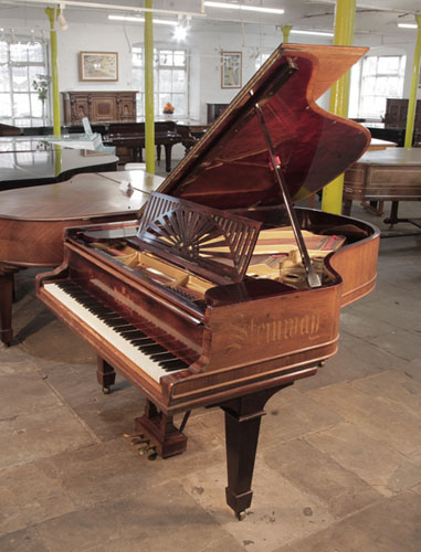 Reconditioned 1911, Steinway Model A grand piano for sale with a polished, rosewood case. The Steinway name is inlaid on the piano cheek in calligraphy style. Piano has an eighty-eight note keyboard and a three-pedal lyre.